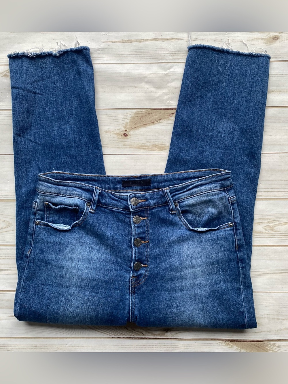 Dark wash exposed button fly mid rise raw hem ankle length straight leg jean 32